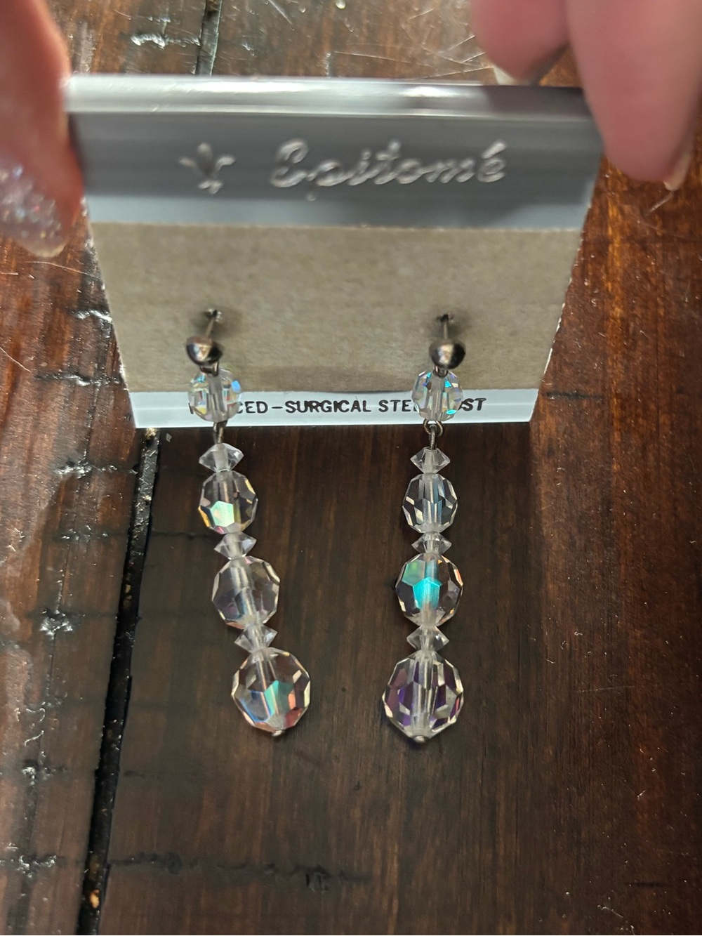 *New- in original packaging:  Vintage- clear iridescent  “Epitome” earrings